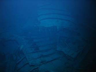 Large piece of twisted steel plate on seabed